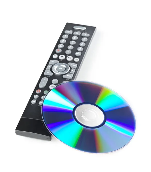 DVD, CD-ROM or Blu-Ray disc with tv or disc player remote contro — Stock Photo, Image