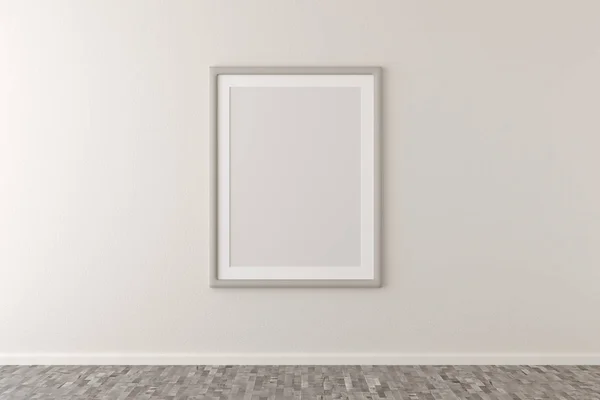 Cadre photo vide accroché au mur blanc dans une pièce lumineuse — Photo