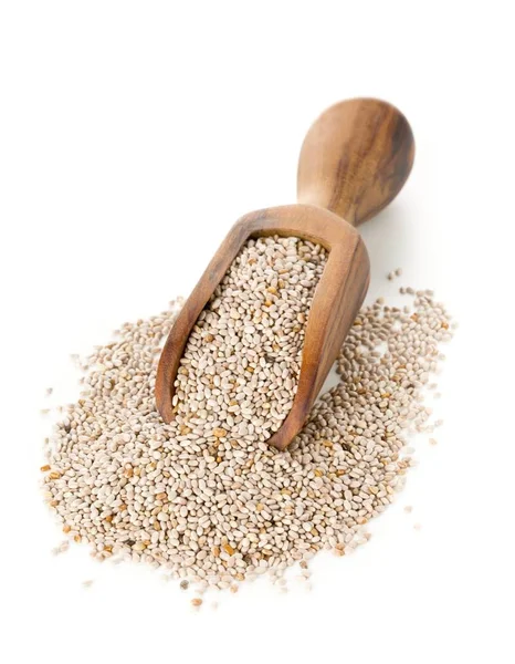 White whole, organic chia seeds heap in brown wooden scoop — Stock Photo, Image