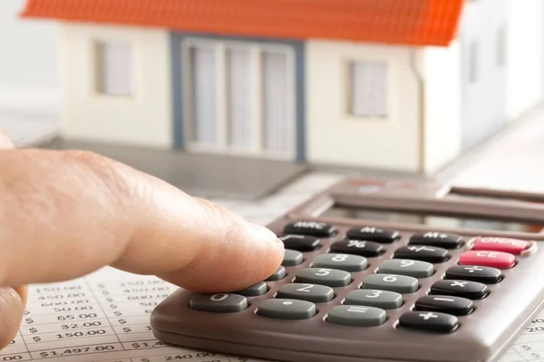 Man Using Pocket Calculator Financial Analysis Sheets House Model Real — Stock Photo, Image