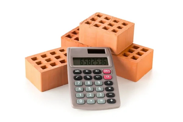 Calculadora Con Ladrillos Sobre Fondo Blanco Bienes Raíces Concepto Costos —  Fotos de Stock