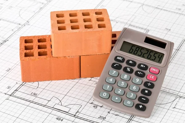 Calculator Met Bakstenen Architectonische Huis Gebouw Blauwdruk Plan Achtergrond Vastgoed — Stockfoto