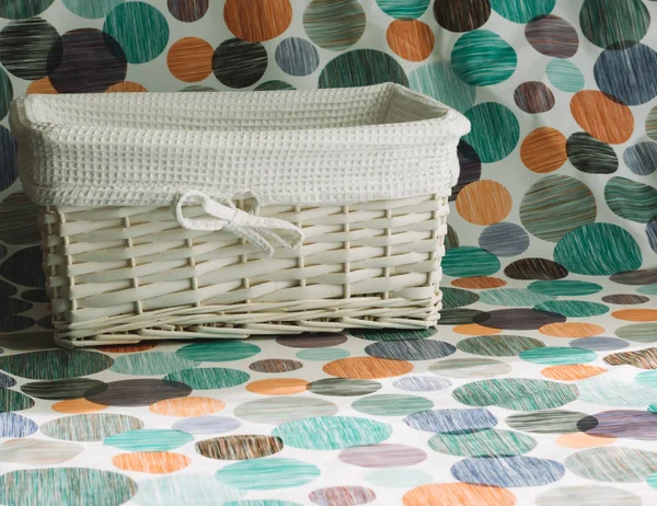 Empty white wicker basket with white cloth interior — Stock Photo, Image