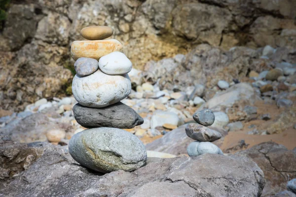 Texture of stacked rocks on the beach in gray colors — Stock Photo, Image