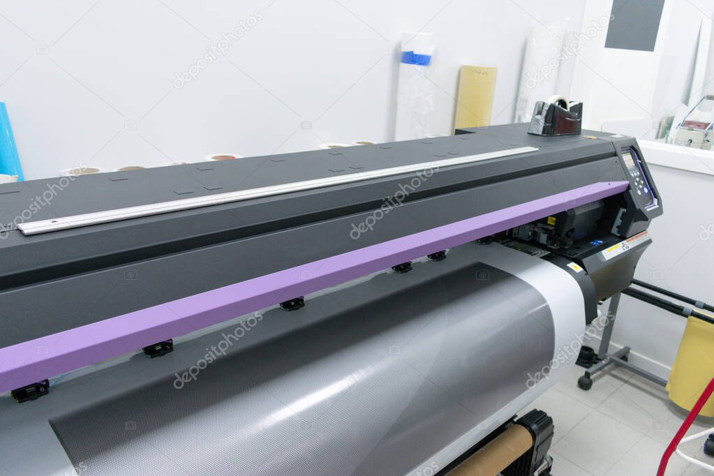 close detail of vinyl printing plotter working