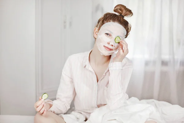 Cute Girl Face Mask Covers One Eye Slice Cucumber Holds — Stock Photo, Image