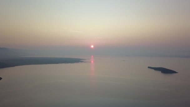 Sunrise about lake Baikal in the summer from drone — Stock Video