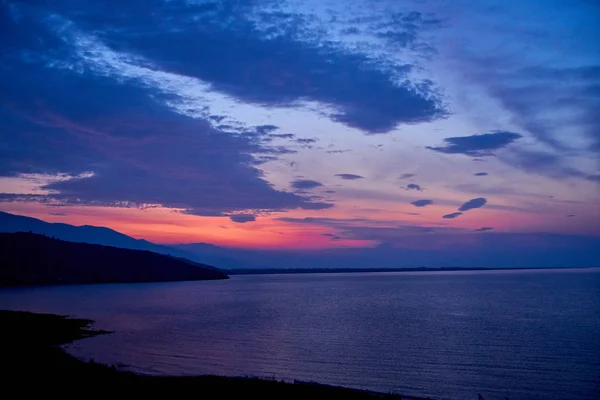Sunrise about lake Baikal in the summer — Stock Photo, Image