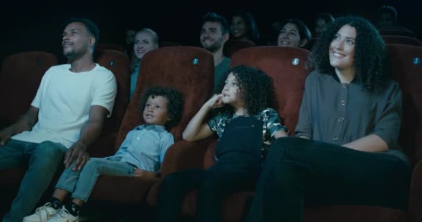 Family Watching Movie Movie Theatre — Stock Video