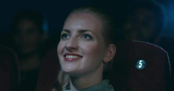 Smiling Young Woman Enjoying Herself Movie Theatre — Stock Video
