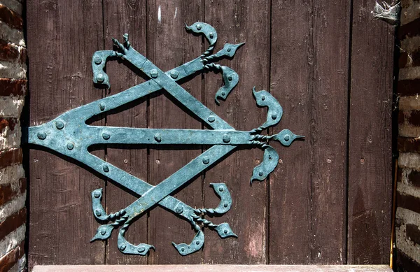 Wrought Iron Ornament Wooden Door — Stock Photo, Image
