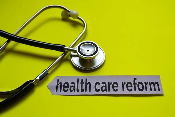 health care reform with stethoscope concept inspiration on yellow background