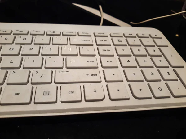 white Computer keyboard background.