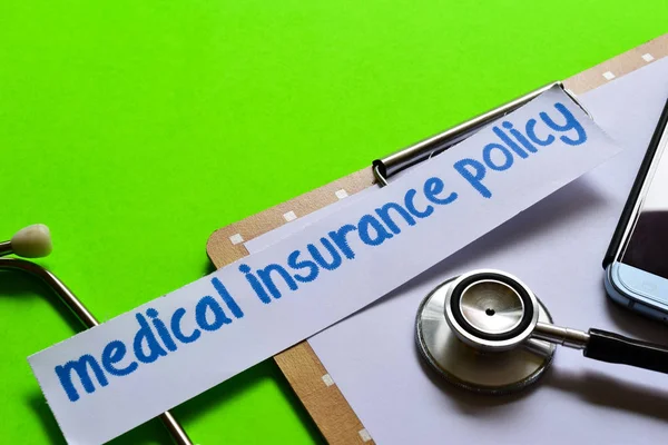 Medical insurance policy on healthcare concept inspiration with green background