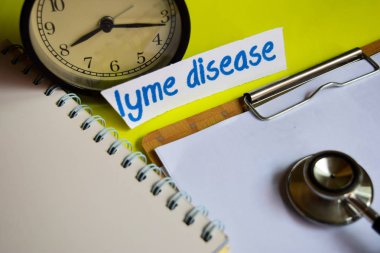Lyme disease on healthcare concept inspiration on yellow background clipart