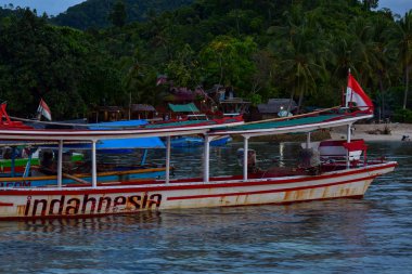 traditional fishing wooden boat near pahawang island. Bandar Lampung. Indonesia. Traveling concept. Upload at Lampung, Indonesia in March 2019. clipart
