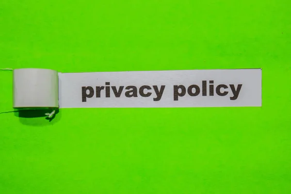 Privacy Policy, Inspiration and business concept on green torn paper