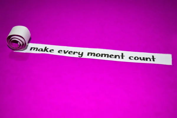 Make every moment count text, Inspiration, Motivation and business concept on purple torn paper