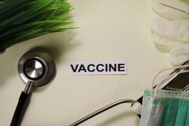 Masa arka planda ilham ve sağlık / tıbbi kavram ile Aşı