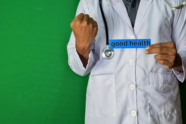 Doctor Standing Hold Good Health Paper Text Green Background Medical — Stock Photo, Image