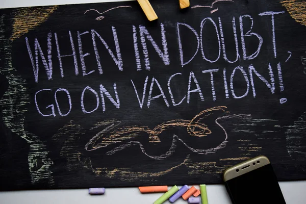 Travel lifestyle inspiration quotes on chalkboard