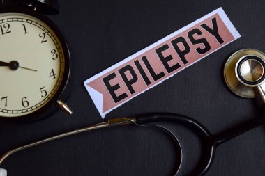 Sağlık Kavramı İlham ile baskı kağıt epilepsi. çalar saat, Siyah stetoskop.