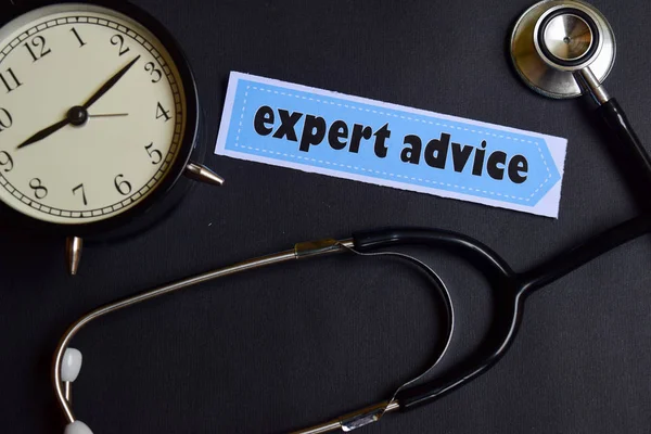 Expert Advice on the paper with Healthcare Concept Inspiration. alarm clock, Black stethoscope.