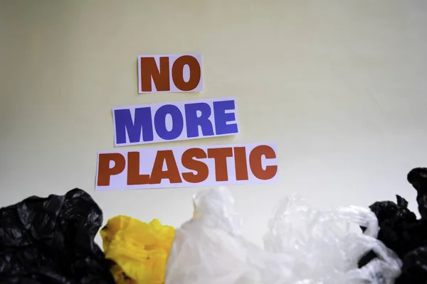 No more plastic message. It shows a plastic with motto and selective focus no more plastic text.