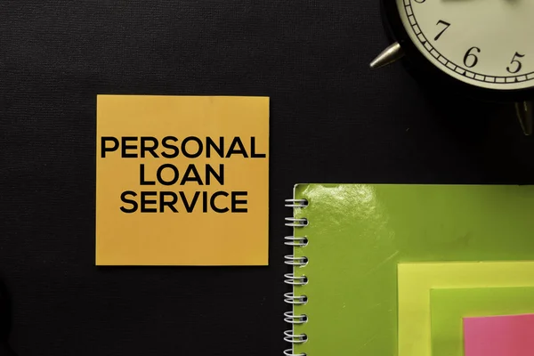 Personal Loan Service text on top view office desk table of Business workplace and business objects.