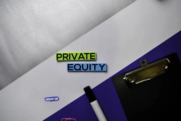 Private Equity text on sticky notes with color office desk concept
