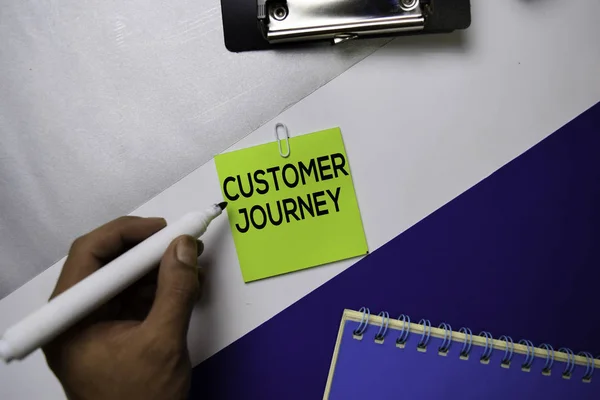 Customer Journey text on sticky notes with color office desk concept