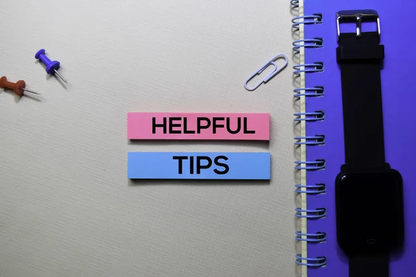 Helpful Tips text on sticky notes isolated on office desk — Stock Photo, Image