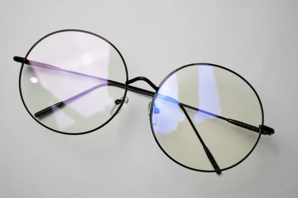 lentes de sol redondos