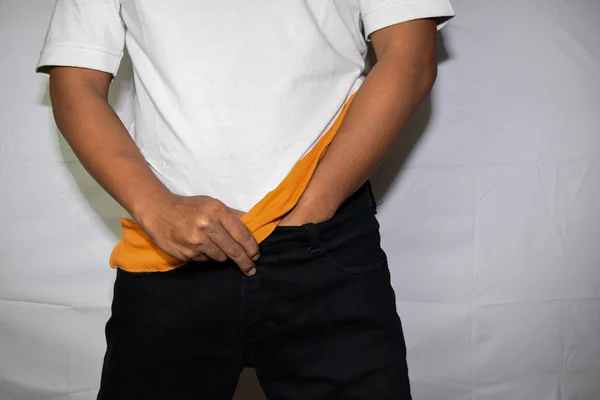 Close up Asian man covering his crotch isolated on white background — Stock Image Close up Asian man covering his crotch isolated on white background Stock Image