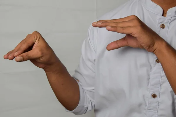 Close up Asian man shows hand gestures it means NO isolated on white background. Língua de sinais americana — Fotografia de Stock