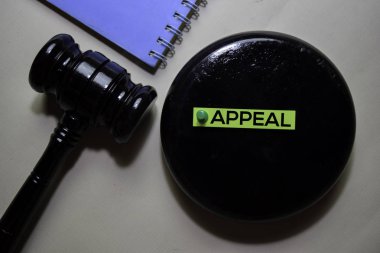 Appeal text on sticky notes and gavel isolated on office desk. Justice law concept clipart