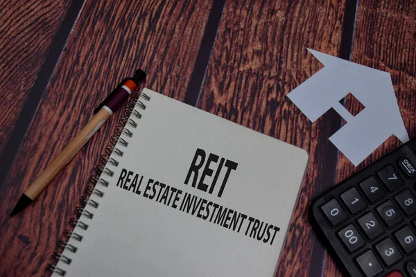 Book Reit Real Estate Investment Trust Isolated Wooden Table — Φωτογραφία Αρχείου