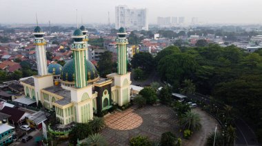 Al Barkah Mosque Largest Masjid in Bekasi, Ramadan Eid Concept background, Travel and tourism. With smog pollution. Bekasi, Indonesia June 5 2020