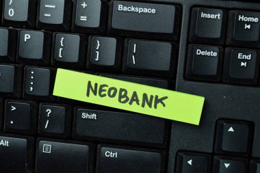 NEOBANK ofis masasında izole edilmiş yapışkan notlara yazsın.