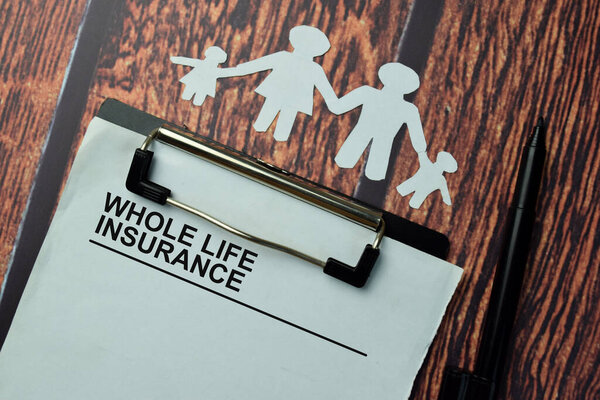 Whole Life Insurance write on a paperwork isolated on office desk.