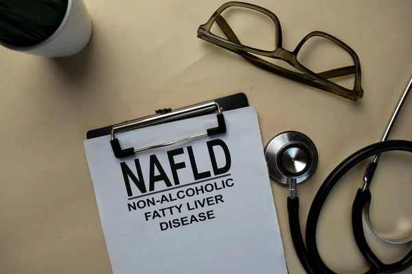 NAFLD - Non-Alcoholic Fatty Liver Disease write on a paperwork isolated on office desk.
