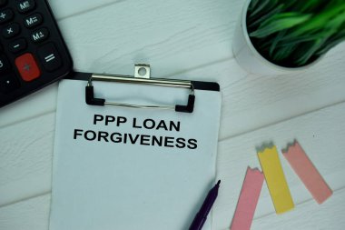 PPP Kredi Bağışlayıcılığı, ofis masasındaki izole bir evrakta yazıyor..