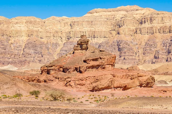 View form below on Spiral Hill rocky mountain in Timna National Park in Aravah Valley desert in Israel