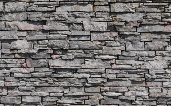 Patrón decorativo de superficie de pared de piedra. Textura de fondo piedra . — Foto de Stock