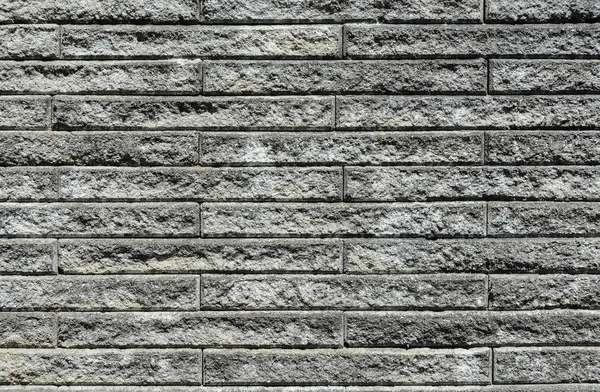 Тло текстури стіни з сірого каменю. Оздоблення бетону — стокове фото