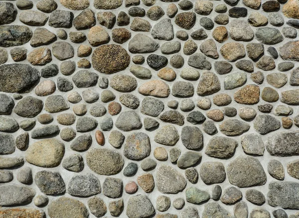 Durva kavics mozaik textúra háttér a cement — Stock Fotó