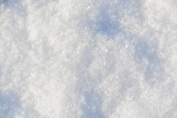 Białe kryształy śniegu. Tło tekstury — Zdjęcie stockowe