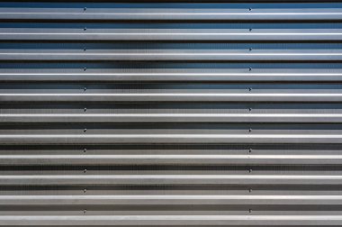 Oluklu metal levha doku arka plan. Modern yapı malzemesi.