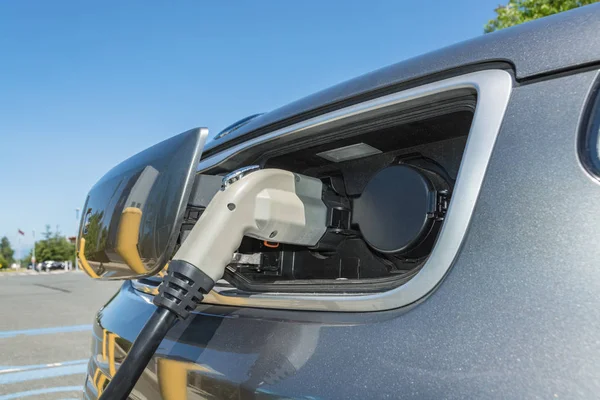 Electric plug connected to EV for energy fulfil from charging station