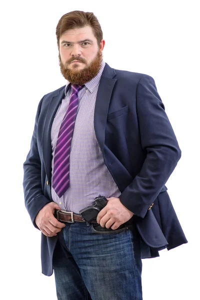 Portrait of big handsome serious bearded business man with gun i — Stock Photo, Image